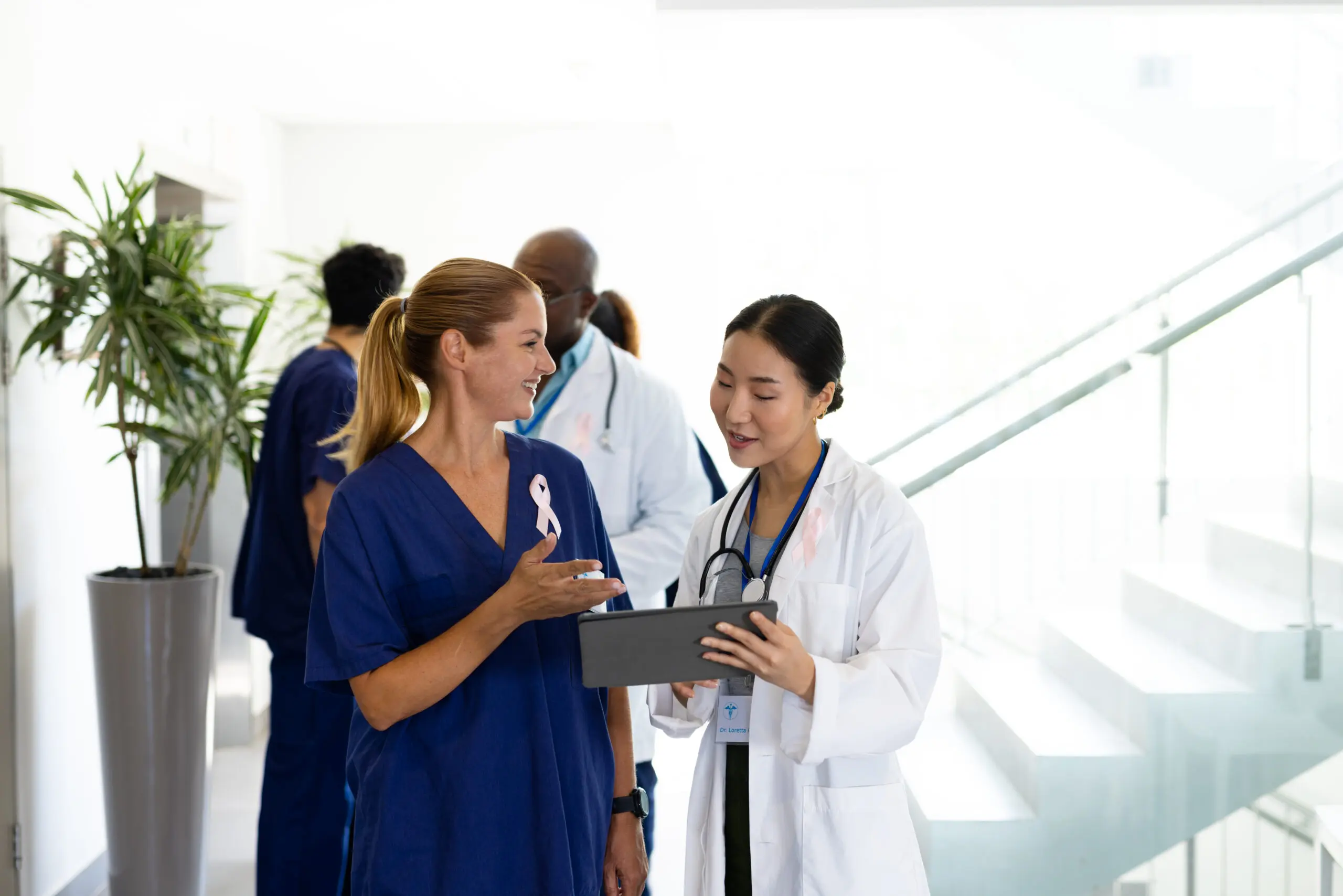 Healthcare professionals reviewing information together