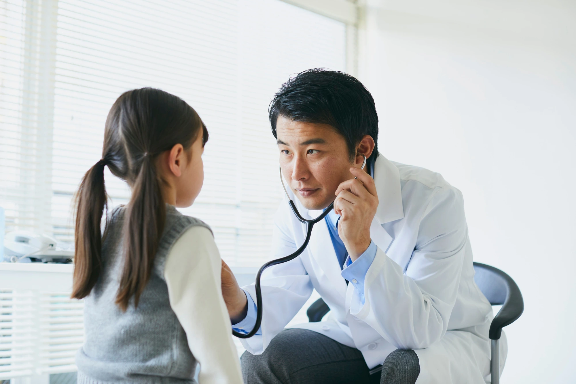 Pediatric doctor with patient