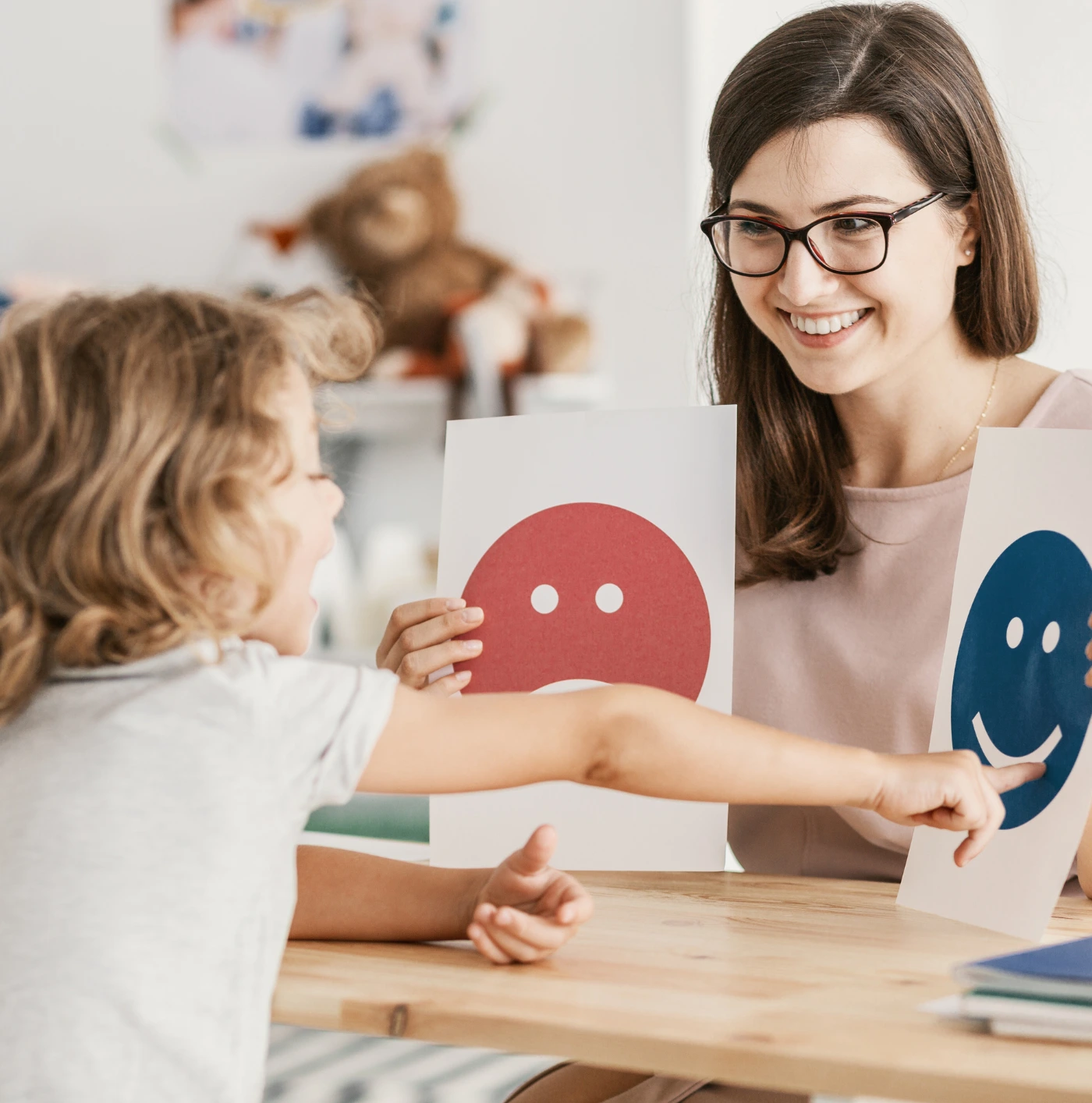 Speech therapist working with a child
